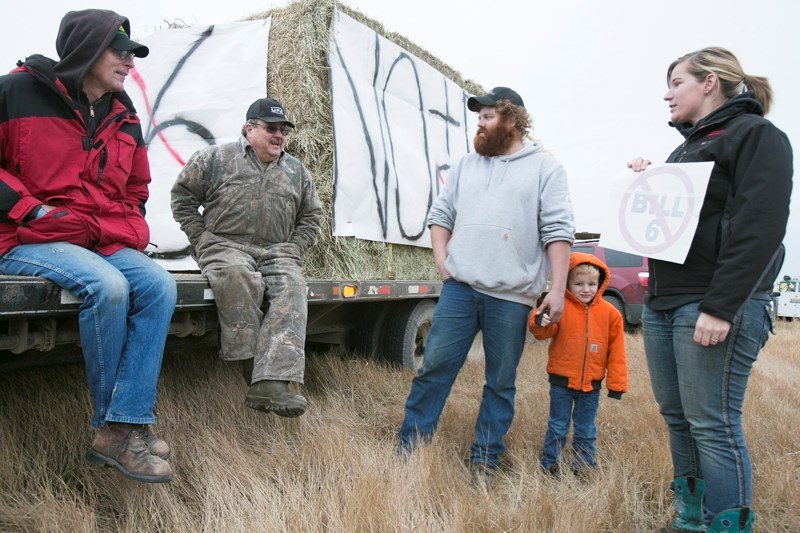 Residents assemble at the start of the convoy on Dec. 9.