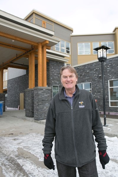 Mountain View Seniors&#8217; Housing CAO Sam Smalldon stands outside the Sundre Seniors&#8217; Supportive Living Facility on Feb. 2. Construction at the site is going strong, 