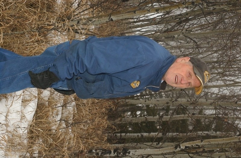 Ninety-year-old Olds resident Myrl Goddard stands at the site of the historic Olds Ski Hill about 10 kilometres west of Olds on Feb. 10 . The hill officially opened for