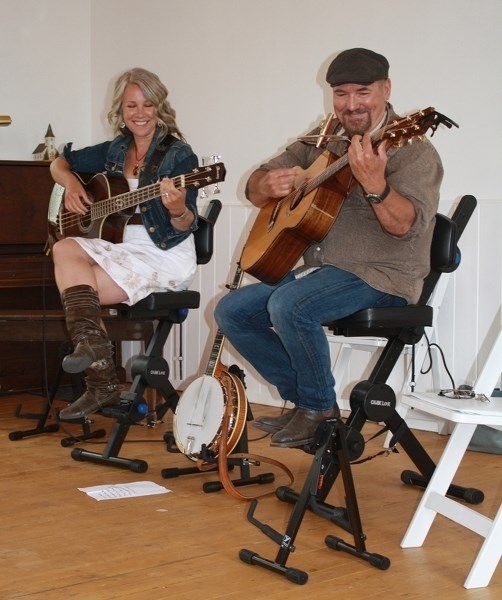 Over the Moon members Suzanne Levesque and Craig Bignell perform in the Water Valley Events Centre during the 18th annual Water Valley Celtic Festival on June 18.