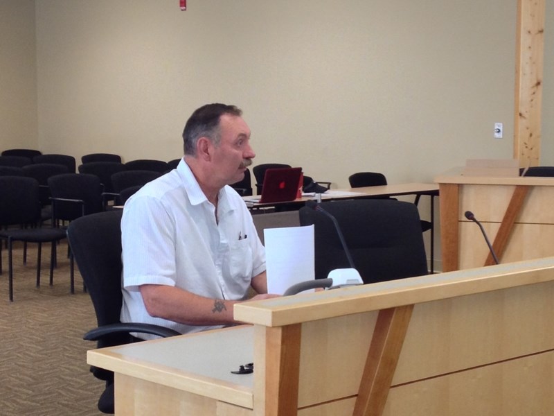 Club manager Randy Ackert speaks with the municipal planning commission on July 7.