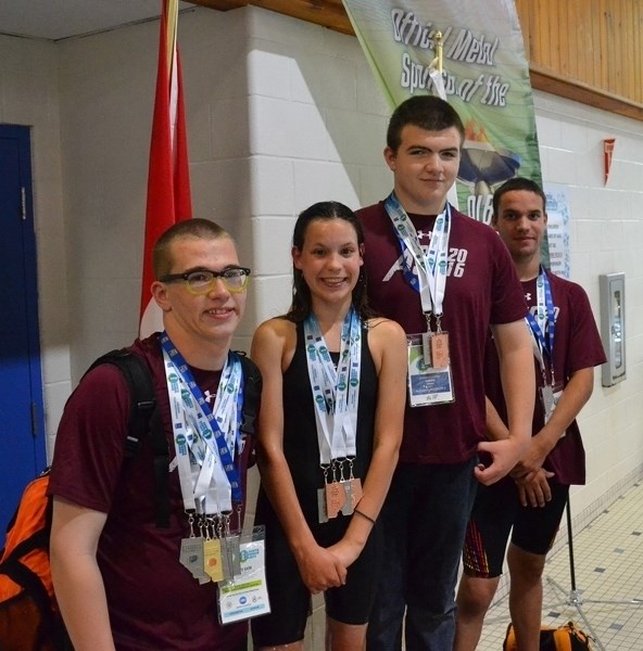 Olds Rapids swimmers at the Alberta Summer Games in Leduc. From left, Wesley Wilks, Angela Lowther, Stephen McMurter and Ian Lowther.