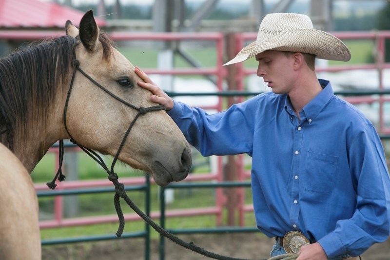 Cole Matier works with a colt during the competition.