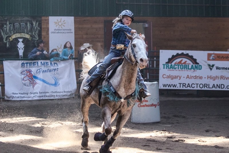 Casey Cyrankiewicz competes in the Mountain View Cowpoke Junior Rodeo (MVCJR) barrel racing finals at the Raecer Ranching Riding arena in May. She was named top all-around