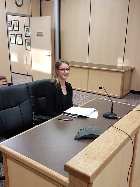 Sarah Neilsen, with Urban Systems, meets with Carstairs town council on Sept. 26.