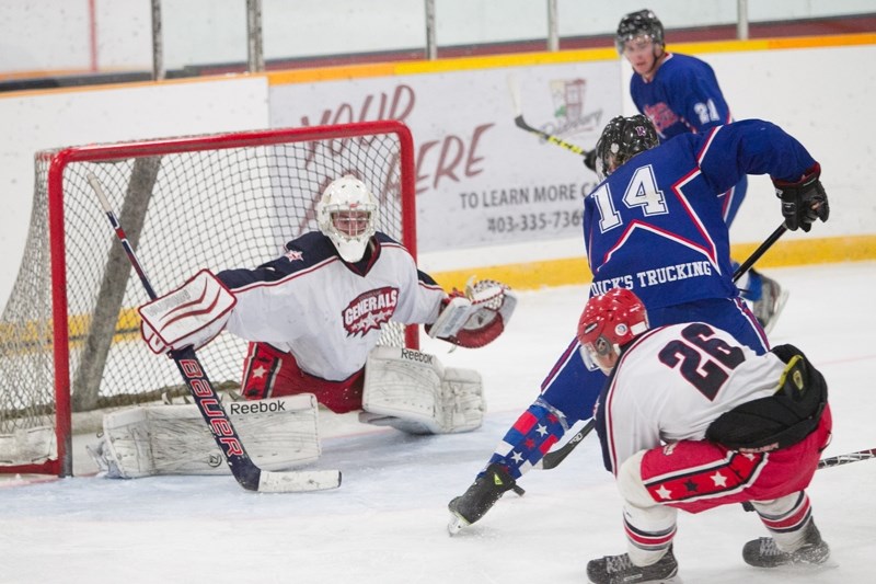 Mountainview Colts player Trey Wallace attempts to score on the Generals&#8217; goaltender.