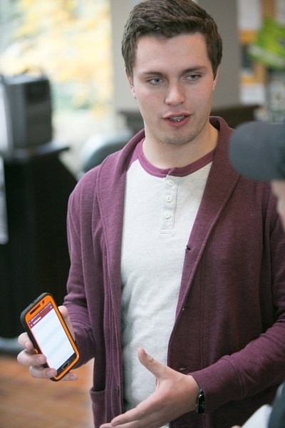 Kier Scott, Olds College students&#8217; association president, show off the new app during the official launch last week.