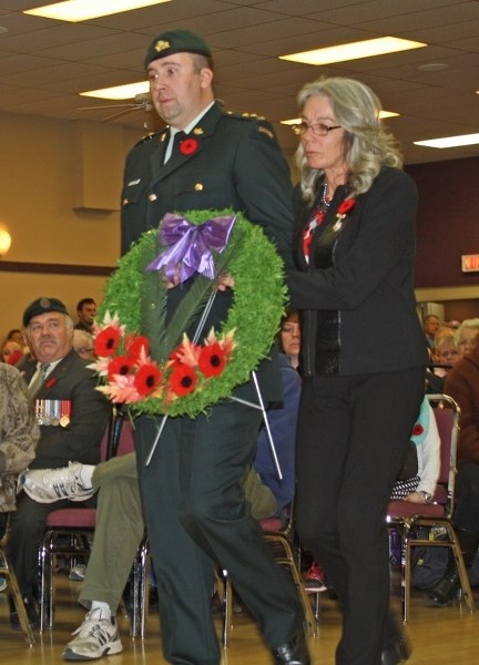 Memorial Silver Cross Mother Susan Curnow lays the first wreath of remembrance at the Carstairs Legion&#8217;s Remembrance Day ceremony. Curnow&#8217;s son Richard was a