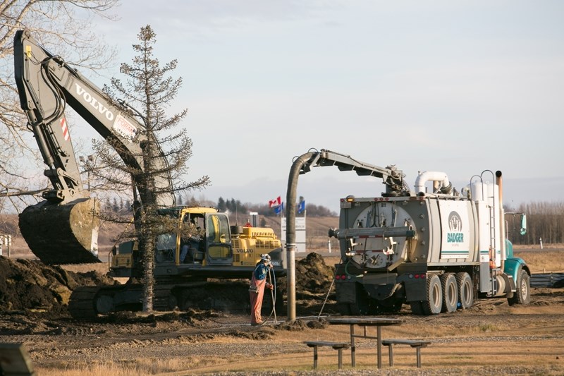 Crews work on the Rosebud Trunk Line project in the Rosebud Valley Campground off of Highway 582 on Nov. 16.