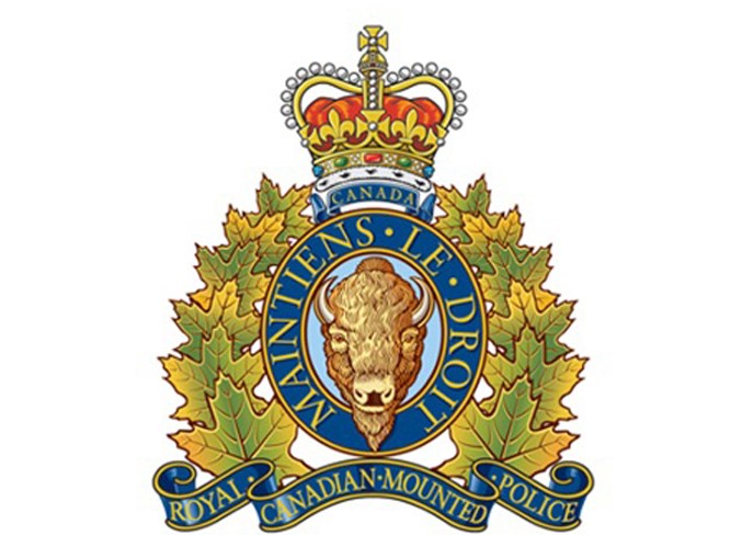 RCMP have charged four people with conspiracy to committ murder.