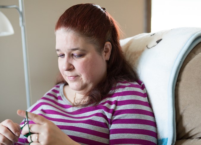 Tammy Bergeron crochets a blanket at her home in Carstairs on April 14.