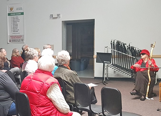 Jan Truss, right, speaks with guests at the recent Cremona event.