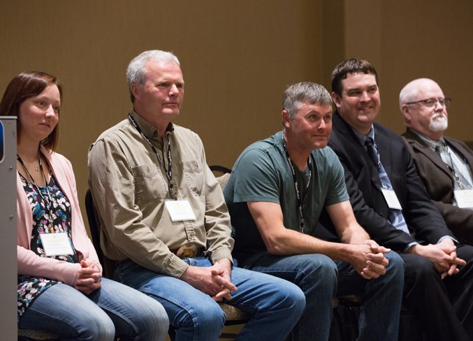 Members take part in a panel discussion during the March 21 conference