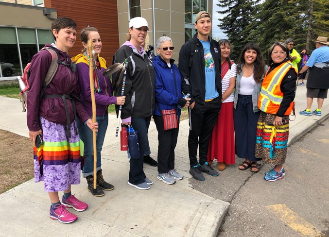 Walkers prepare to leave Olds College Tuesday morning on the way to Carstairs.