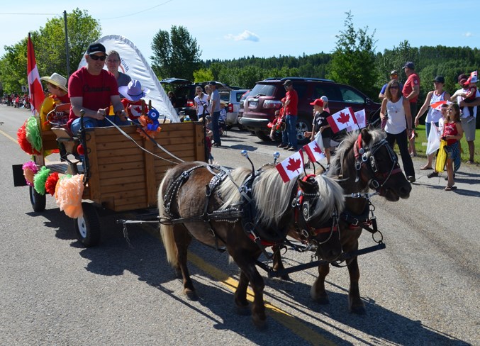 One of the dozens of floats in the Canada Day parade in Cremona.