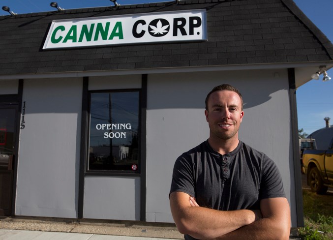 Alex Metzger in front of Canna Corp in Carstairs on Aug. 27.