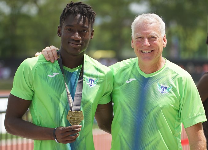 web jeremiah &amp; ron with gold medal