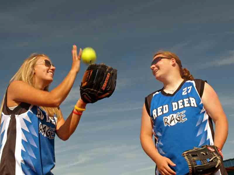 Innisfail&#8217;s Brianna Weinrauch (left) and Cassandra Kirkham, fastball players for the Red Deer Rage, are in Winnipeg this week to compete in the 2011 U19 Women&#8217;s