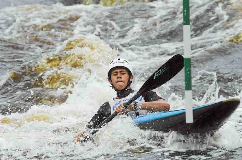 Levi Stevenson battles the rapid during the pre-world competition this summer in Wausu, Wisconsin. He recently brought home five medals from a national championship in