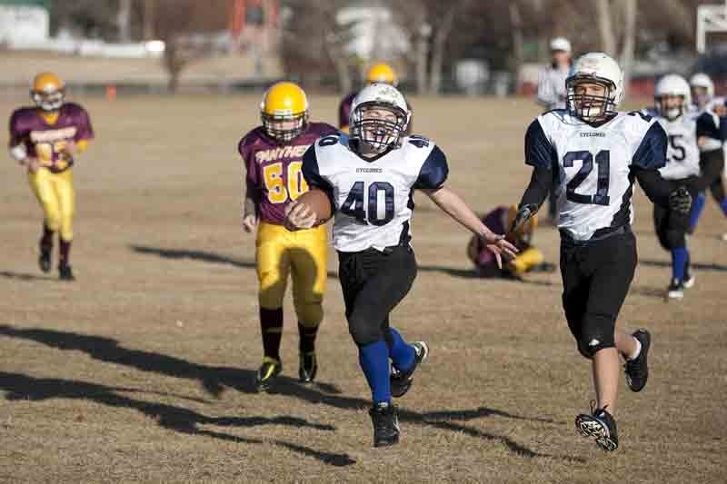 Innisfail Cyclones player Cole Martin scores a touch down during the Cyclones game against the Stettler Panthers last Saturday. The game was part of the Central Peewee