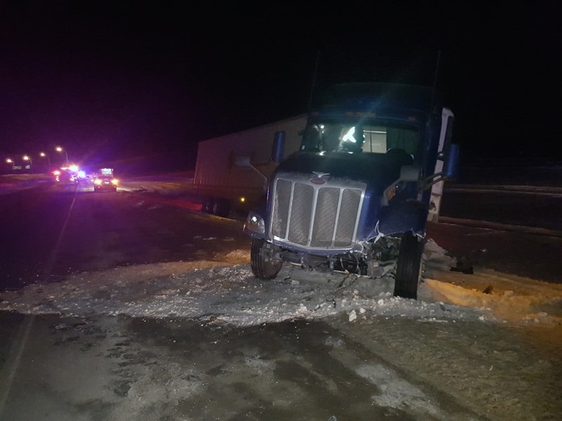 The crash scene on the Queen Elizabeth Highway near Bowden in the early morning hours of Dec. 29 that resulted in the deaths of two Calgarians, one a Good Samaritan who was