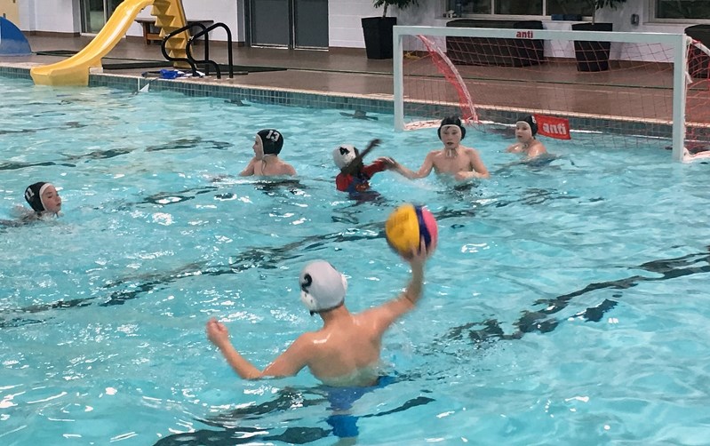 Innisfail Hurricane players practise their skills during a recent intramural game Feb. 6 at the Innisfail Aquatic Centre. The water polo club runs from September to March.