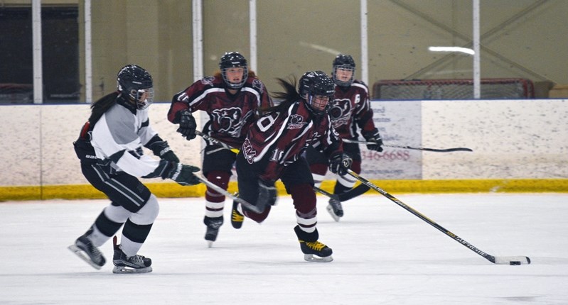 The Central Alberta Amazons, seen here carrying the puck, lost games 3 and 4 in the Alberta Junior Female Hockey League finals to the Sherwood Park Steele, who clinched the