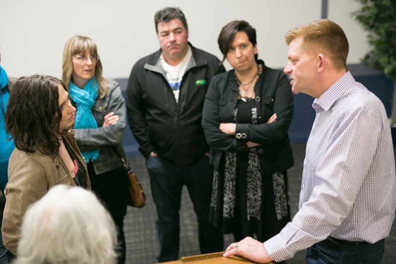 Brian Jean, leader of the Wildrose Party, spoke with attendees at the conclusion of a Unite the Right event in Innisfail on April 8. He said the funding issue on self-managed 