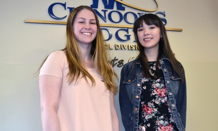 Innisfail High School Grade 12 students Faith Gette, 18, left, and Riona Wiberg, 17, achieved a rare feat this school year. The best friends scored a perfect 100 per cent in