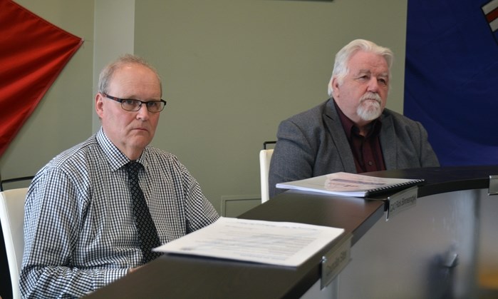 Rick Binnendyk, chief administrative officer for Penhold, and Mayor Dennis Cooper at council on April 10. Penhold residents will see an average of two to four per cent