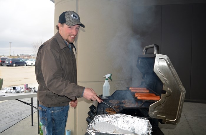 Graham McPhee, Penhold Minor Soccer Association president, helped at the recent barbecue fundraiser for the local group. The association&#8217;s regular season begins on May