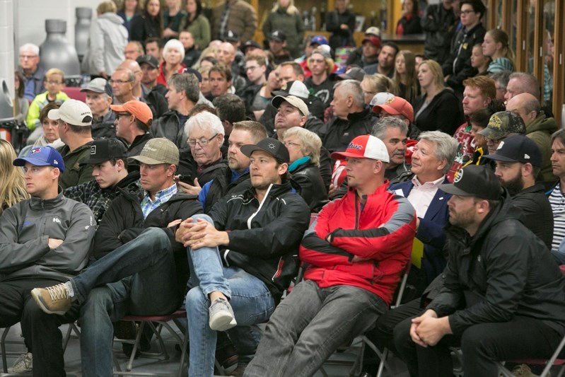 A packed house fills a common area at the Olds Sportsplex.