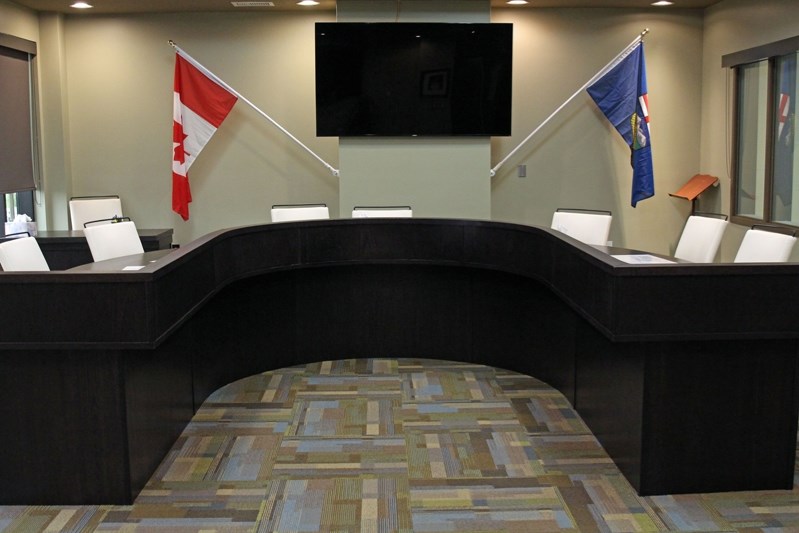 Penhold town council&#8217;s restored desk, previously used by Innisfail&#8217;s town council, sits in its new meeting place at the Penhold Regional Multiplex.