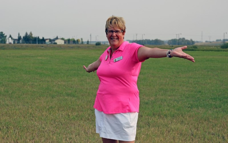 Penhold councillor Kathy Sitter is seeking re-election for her fifth consecutive term. Here she is standing at the future location for a new, all-inclusive park, one of her