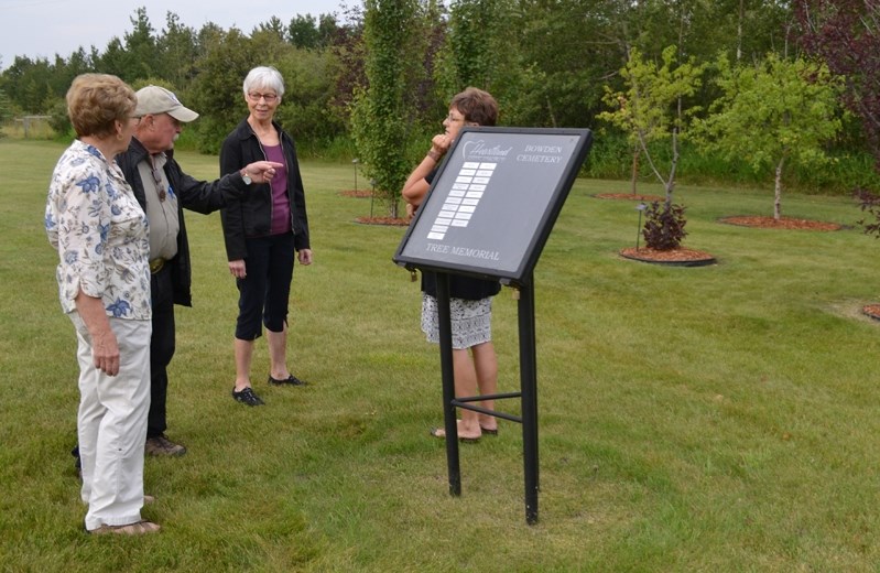 From left, Bowden and District Cemetery Association treasurer Marg Westman, council rep Wayne Milaney, chair Shirley Adams and secretary Sandy Gamble discuss improvements to