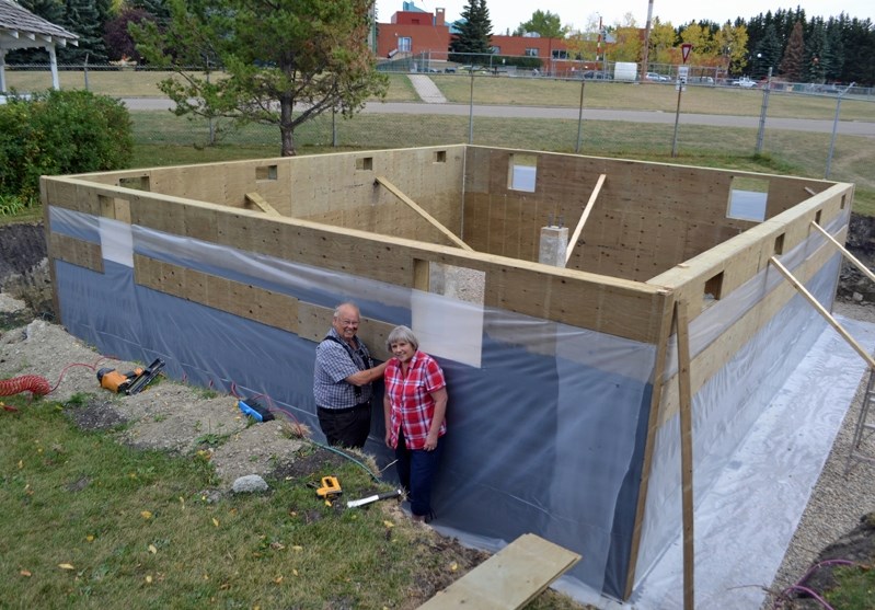 Lawrence Gould, treasurer of the Innisfail and District Historical Society, and president Anna Lenters at the foundation site for the Sinclair House last week.