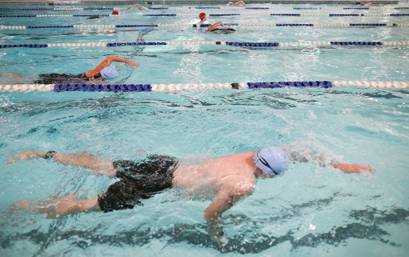 Competitors swim laps at the Innisfail Aquatic Centre during the Innisfail Triathlon on Sept. 9.