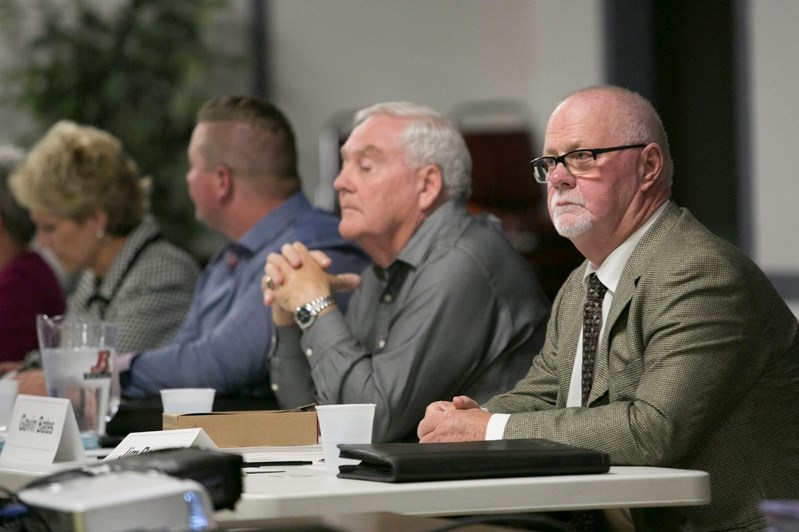 Mayoral candidate Jim Romane, right, flanked by Innisfail councillor hopefuls at the Oct. 4 forum at the Innisfail Royal Canadian Legion.