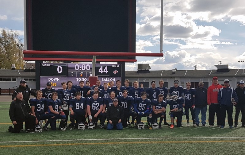 The Innisfail Cyclones team proudly stand together at Calgary&#8217;s McMahon Stadium after defeating the Sundre Bisons 44 &#8211; 0 on the Thanksgiving long weekend.