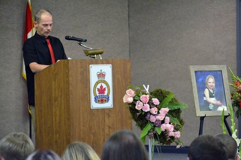 Darcy Aubuchon delivered a heartfelt tribute for his late nine-year-old daughter Brooke during the Nov. 20th memorial service in the auditorium at the Innisfail Royal