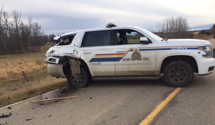 A damaged RCMP cruiser that was struck by the driver of a stolen vehicle.