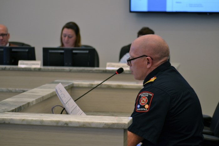 Gary Leith, the town&#8217;s fire chief, presents council a proposed new remuneration policy for the 28-member volunteer fire department at the Nov. 14 council meeting.