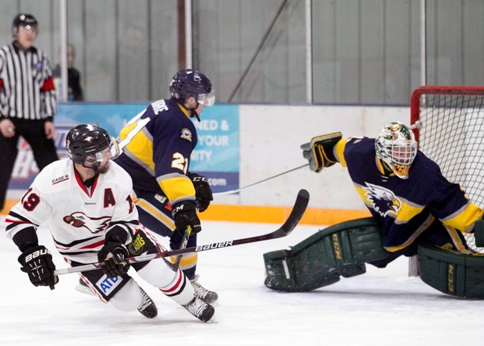 The Innisfail Eagles&#8217; Tyler Beechey shoots on net during the first period against Stony Plain on Friday. Innisfail rallied to win the game 6 &#8211; 5 in double