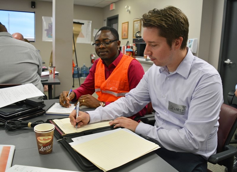 Officials from Innisfail, Bowden, Penhold, Sylvan Lake and other municipalities worked collaboratively together in the emergency coordination centre during a mock disaster in 