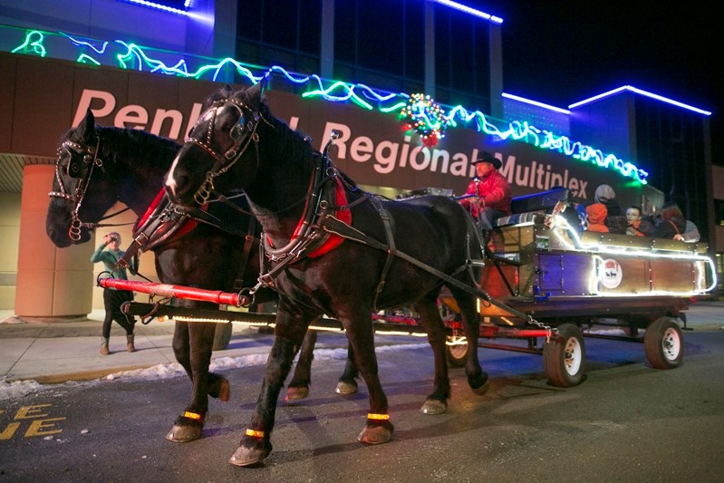 Penholders take off on a horse-drawn wagon ride.