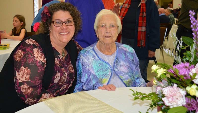 Innisfail&#8217;s Irena Hagel, right, welcomed family and friends, including her grandaughter Alana Gibson, left, for her 100th birthday open house celebration on Nov. 18.