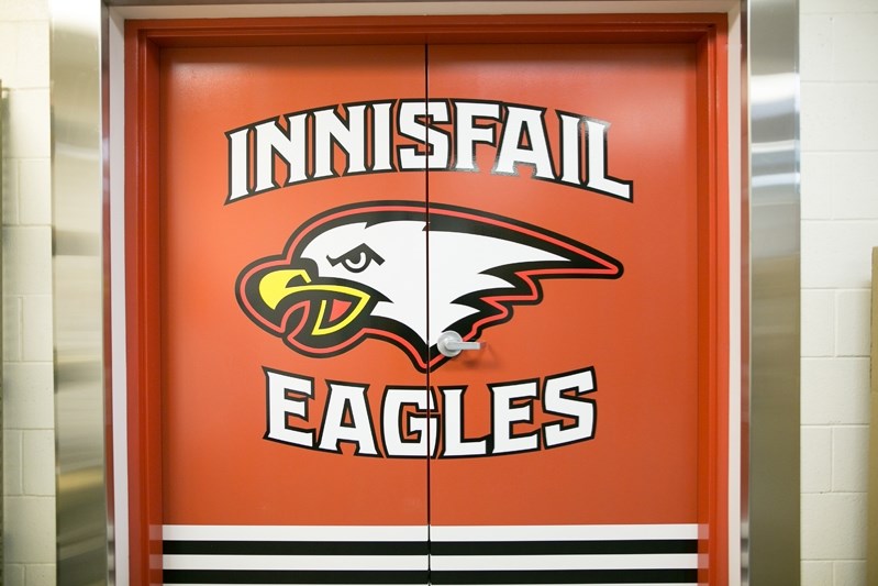 The Innisfail Eagles logo adorns a door that leads to the new dressing room at the Arena.