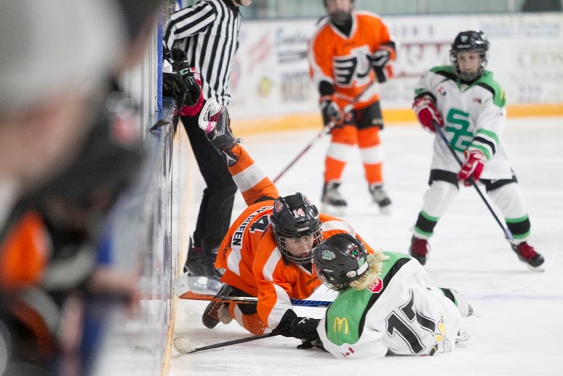 Innisfail Atom A Flyers&#8217; Nate Smith crashes to the ice during the Flyers&#8217; game against the Spruce Grove Knights at the Innisfail Arena on Dec. 9. The game was