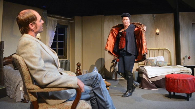 Dave Kinsella and McKinna Elliott rehearse a scene from Innisfail Town Theatre&#8217;s fall production, A Bedfull of Foreigners by David Freeman.