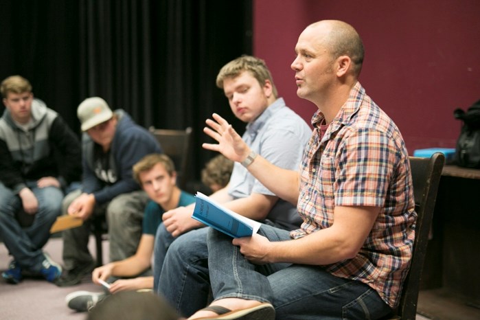 Teacher Rob Burton discusses the premise of Almost, Maine during class.